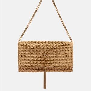 IN SEARCH OF- Yves Saint Laurent Tan Woven Clutch with Logo Tassel